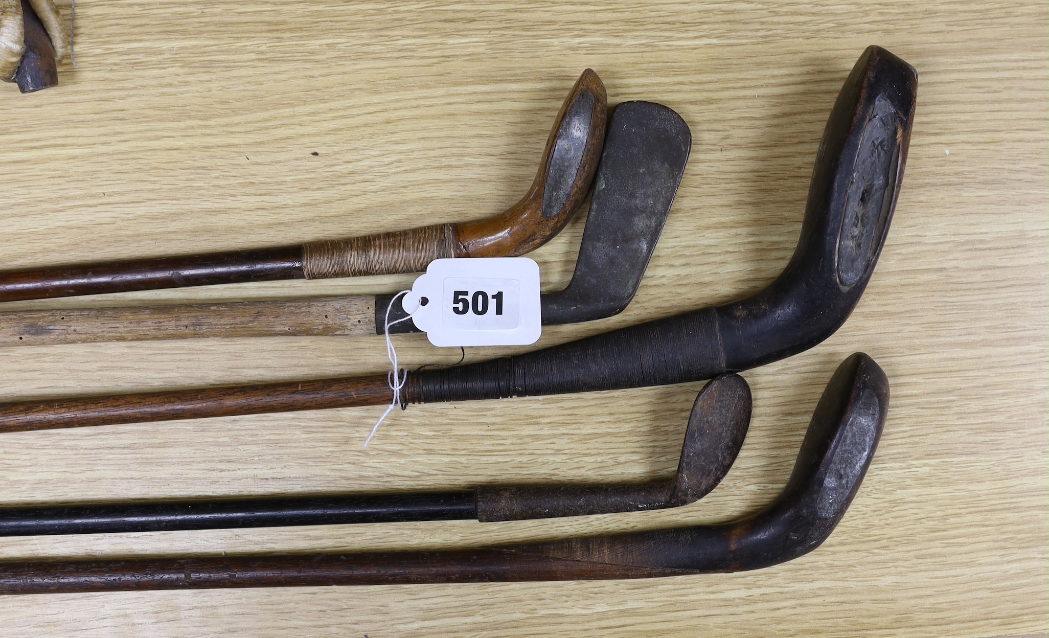 Three Sunday sticks, a dognose club and other golf clubs